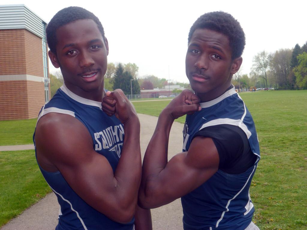 Double strength: Freshman twins DeAndre (left) and Varandre White build up their muscles with daily visits to the school’s weight room. Besides weight-lifting, both also play piano, which they learned from their Levey Middle School choir teacher. - Shannon Stoudemire
