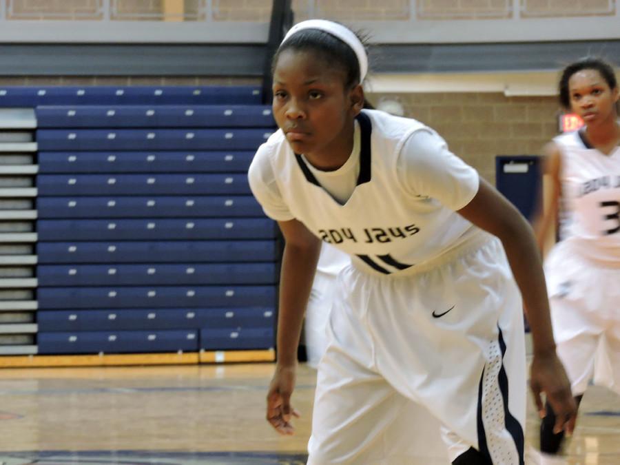 New talent: Freshman Dlayna Holliman focuses on her game. Holliman is the top scorer on the team.