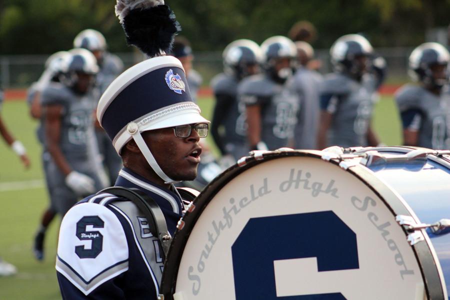 Drum+roll%3A+Senior+Darrius+Hicks+marches+to+the+beat+of+his+own+drum+during+halftime+at+the+North+Farmington+football+game.