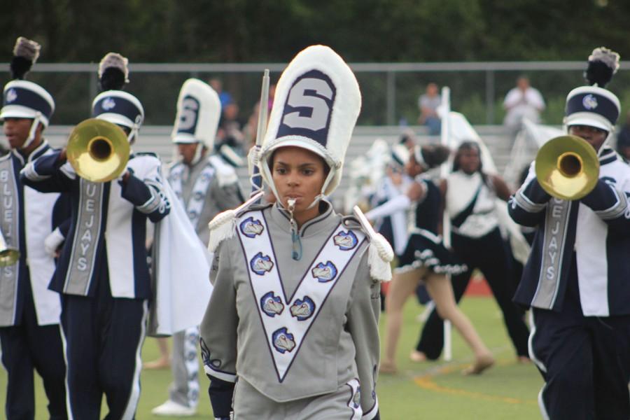 Drum Major Breanna Cross proudly wears the school colors of blue and gray as part of the Marching Blue Jays.