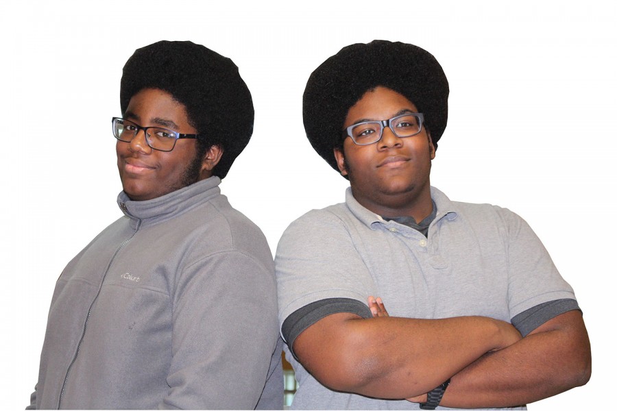 Seniors Emmanuel (left) and Norvell Molex are fraternal twins, born March 14. They both enjoy playing video games. Theyre the only set of twins in their family they know of.